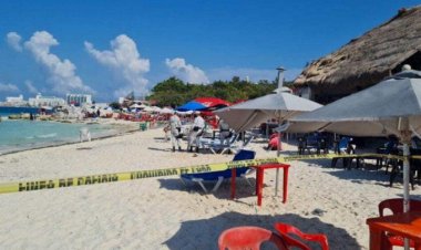 Dos muertos y una turista herida, saldo de balacera en playa de Cancún