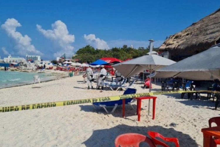 Dos muertos y una turista herida, saldo de balacera en playa de Cancún