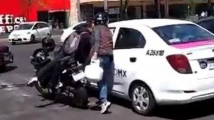 ´Lady gas´ enfurece y arroja tanque contra taxi