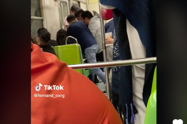Músico ameniza riña en vagón del Metro