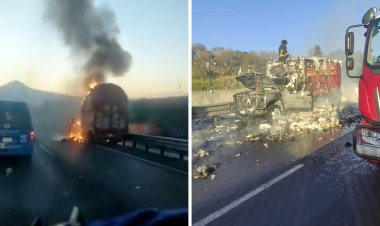 Camioneta de carga se incendia en la México-Puebla