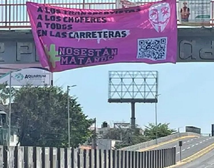 Nos están matando, denuncian integrantes de AMOTAC mediante lonas en el Veracruz